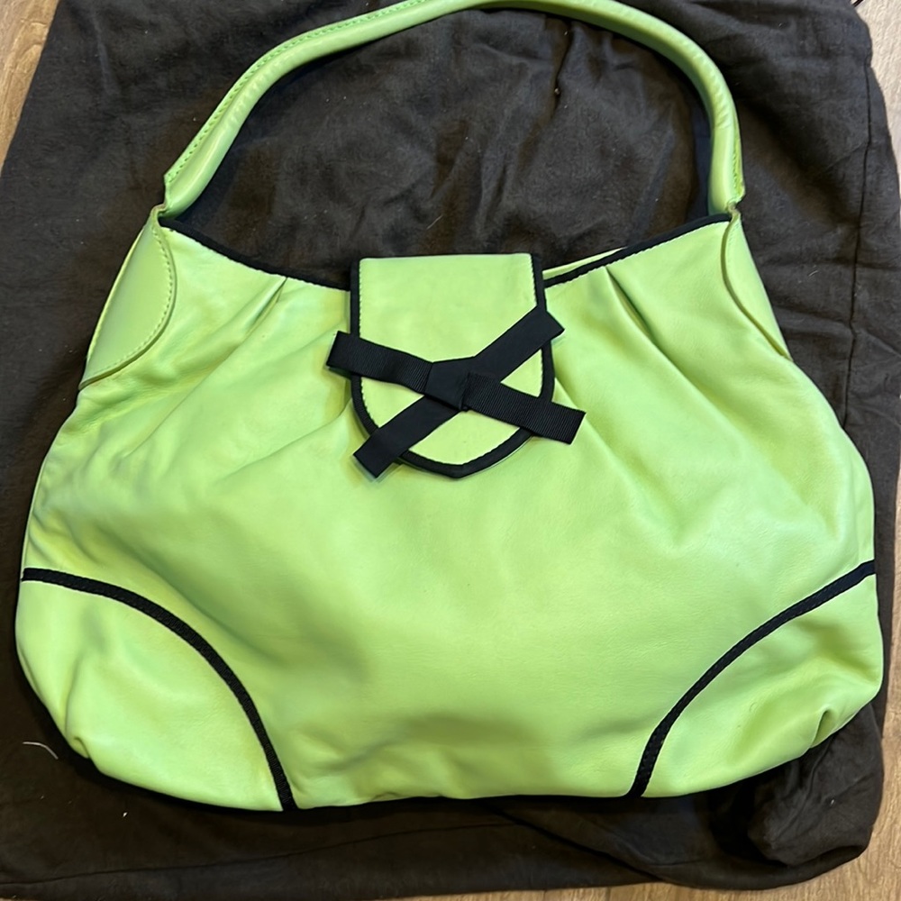 Mint green leather Bruno Magli shoulder bag w black ribbon detail